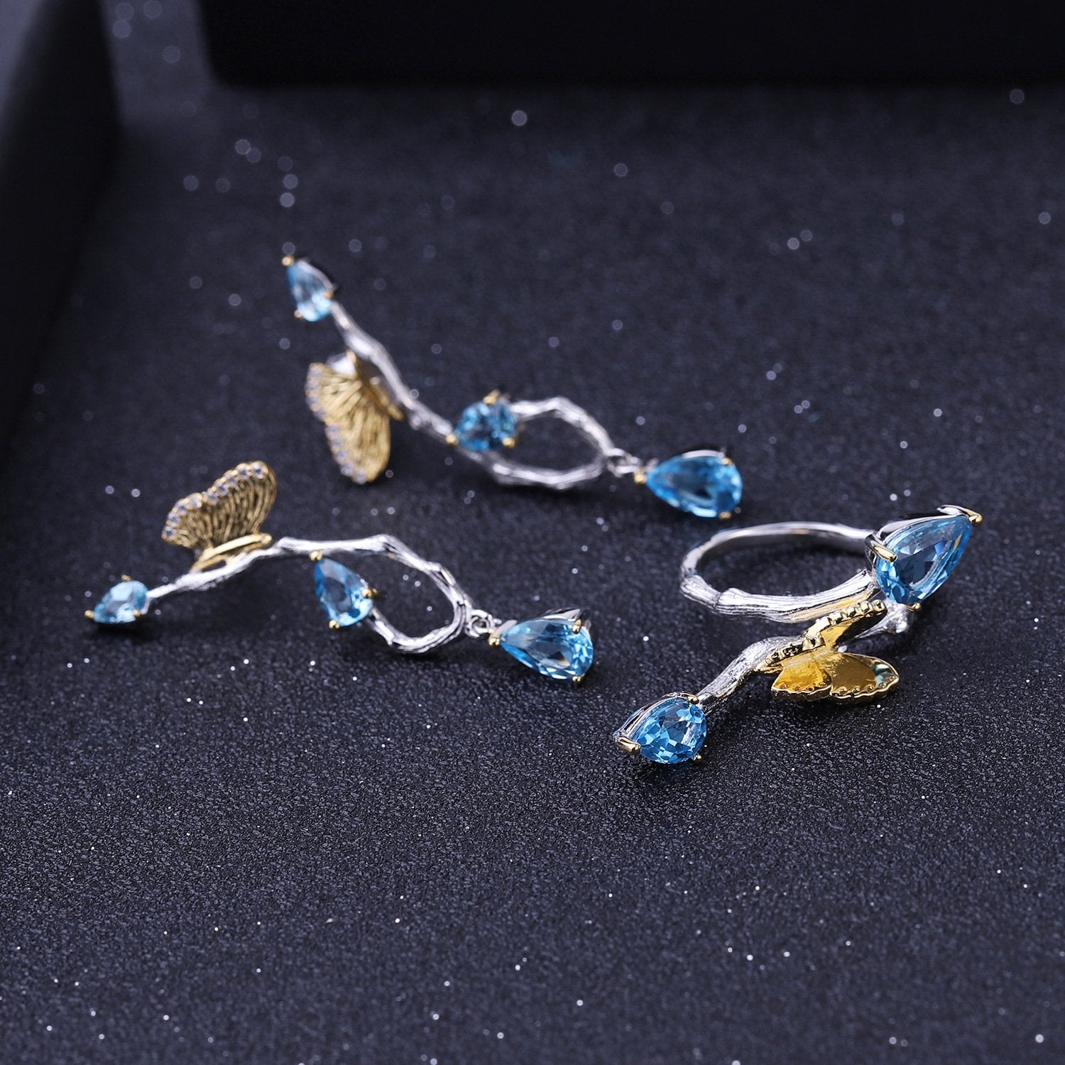 Back view of the Topaz earrings showing clasp and hallmark