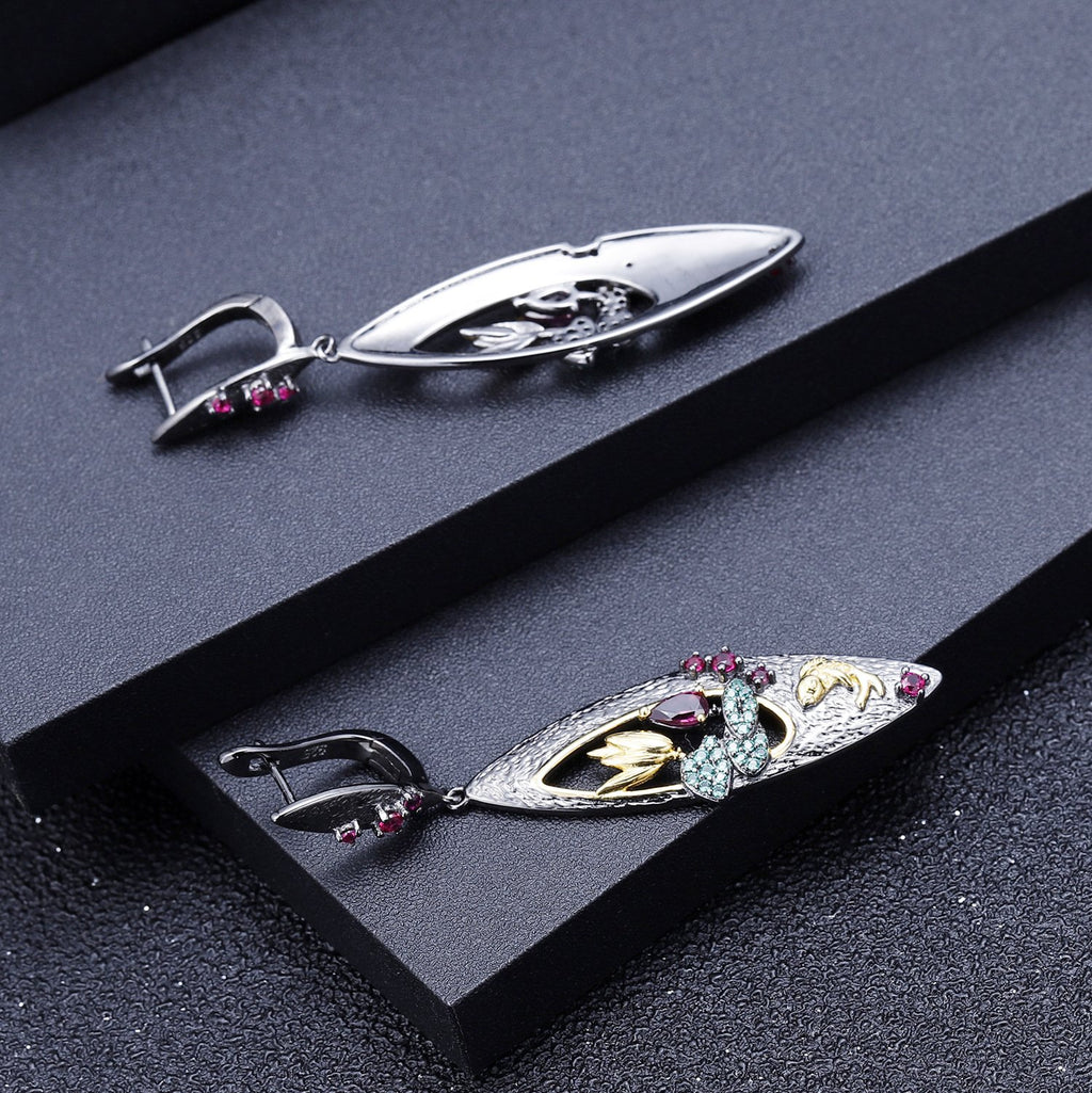 Close-up of the Rhodolite Garnet setting on these earrings