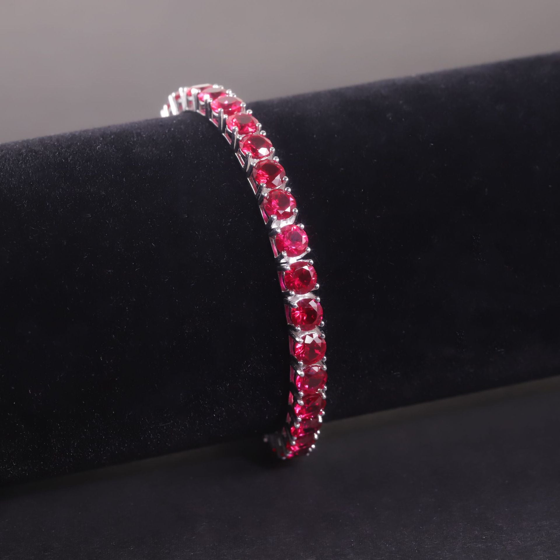 Close-up of the 5mm Lab-Grown Ruby setting on this bracelet