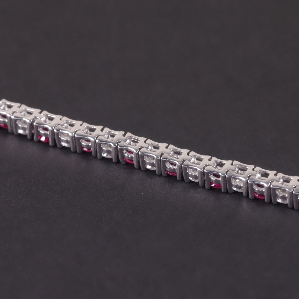 Lab-Grown Ruby 3/4/5mm Tennis Bracelet 925 Sterling Silver (gemstone setting detail)